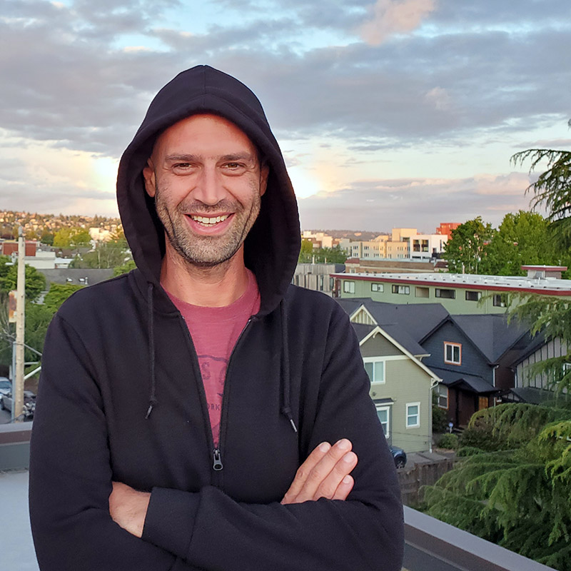 Jeremy Mastroianni on roof of house